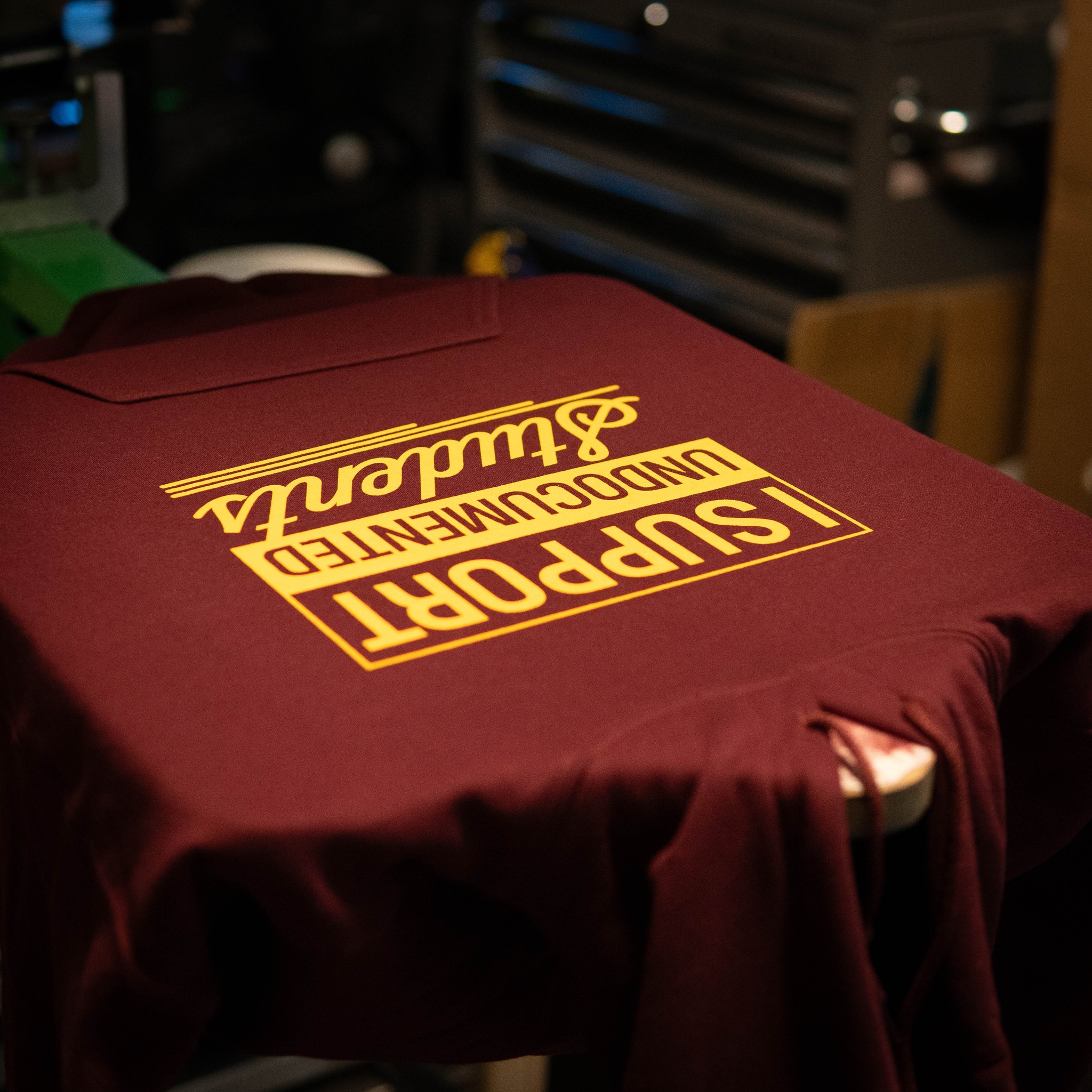 Stack of custom printed shirts
