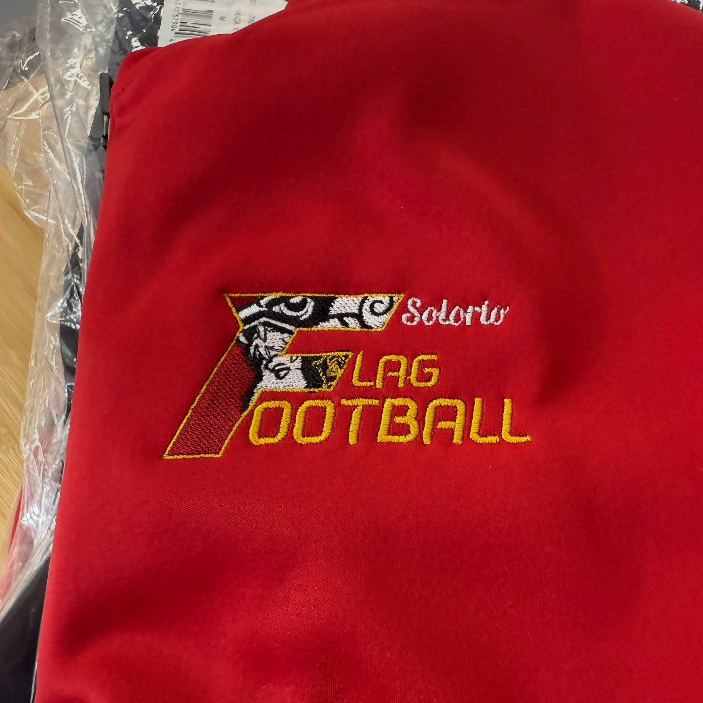 Red flag football shirt