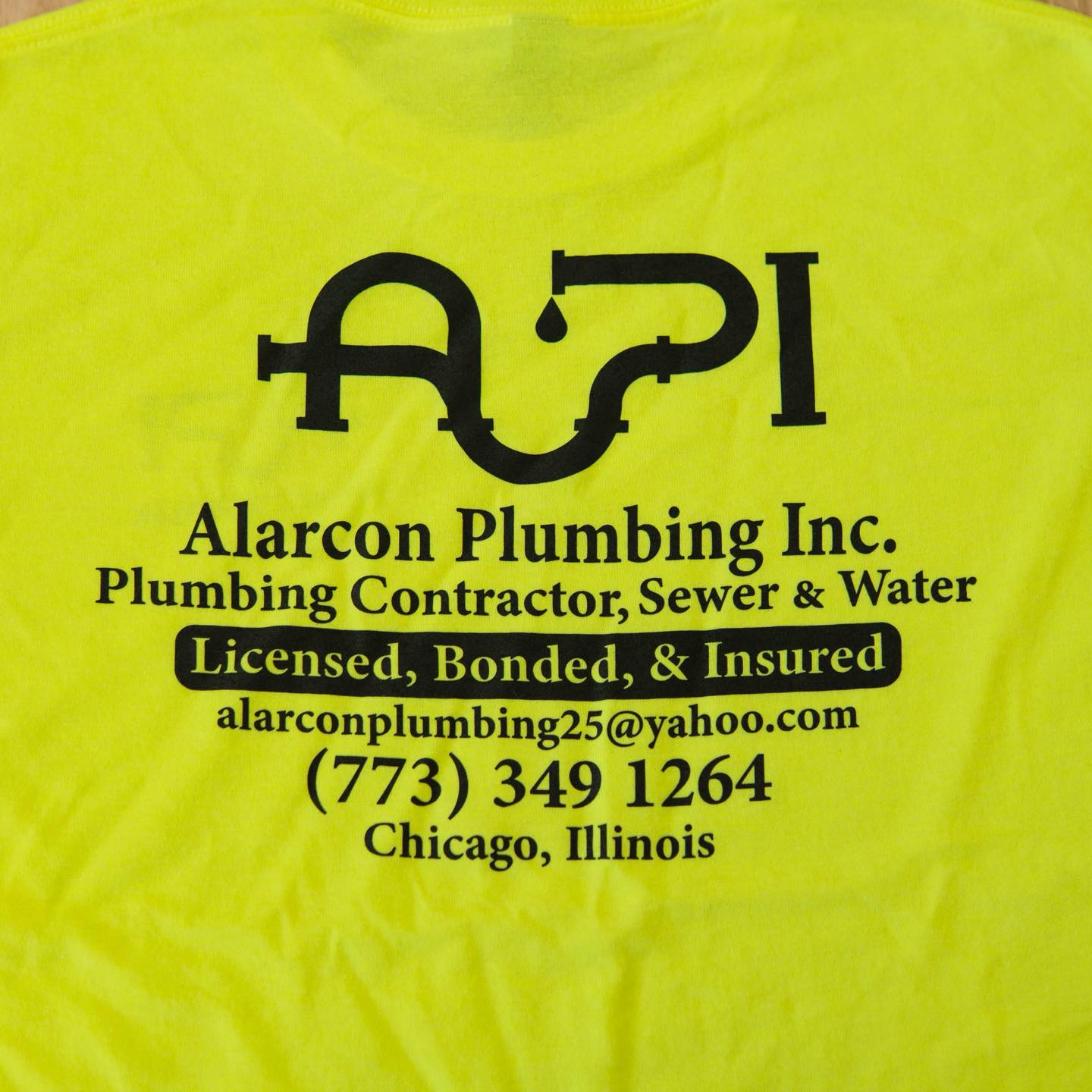 Neon plumbing contractor shirt
