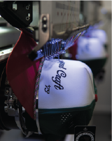 Embroidery machine stitching a custom hat