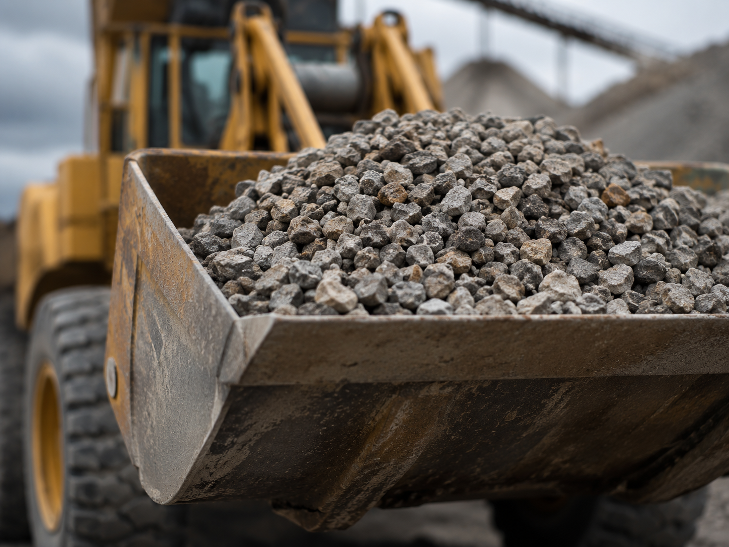Loader bucket carrying recycled aggregate
